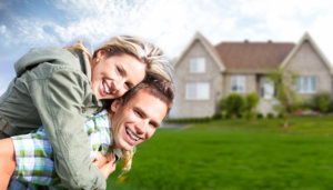 Happy couple buying house